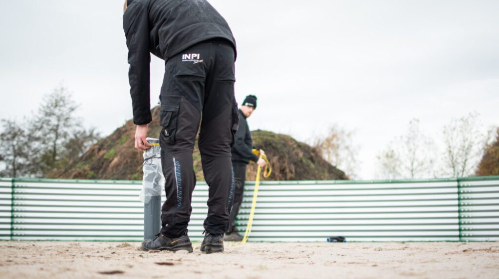 Installing a water tank at a local Christmas tree nursery, the Netherlands